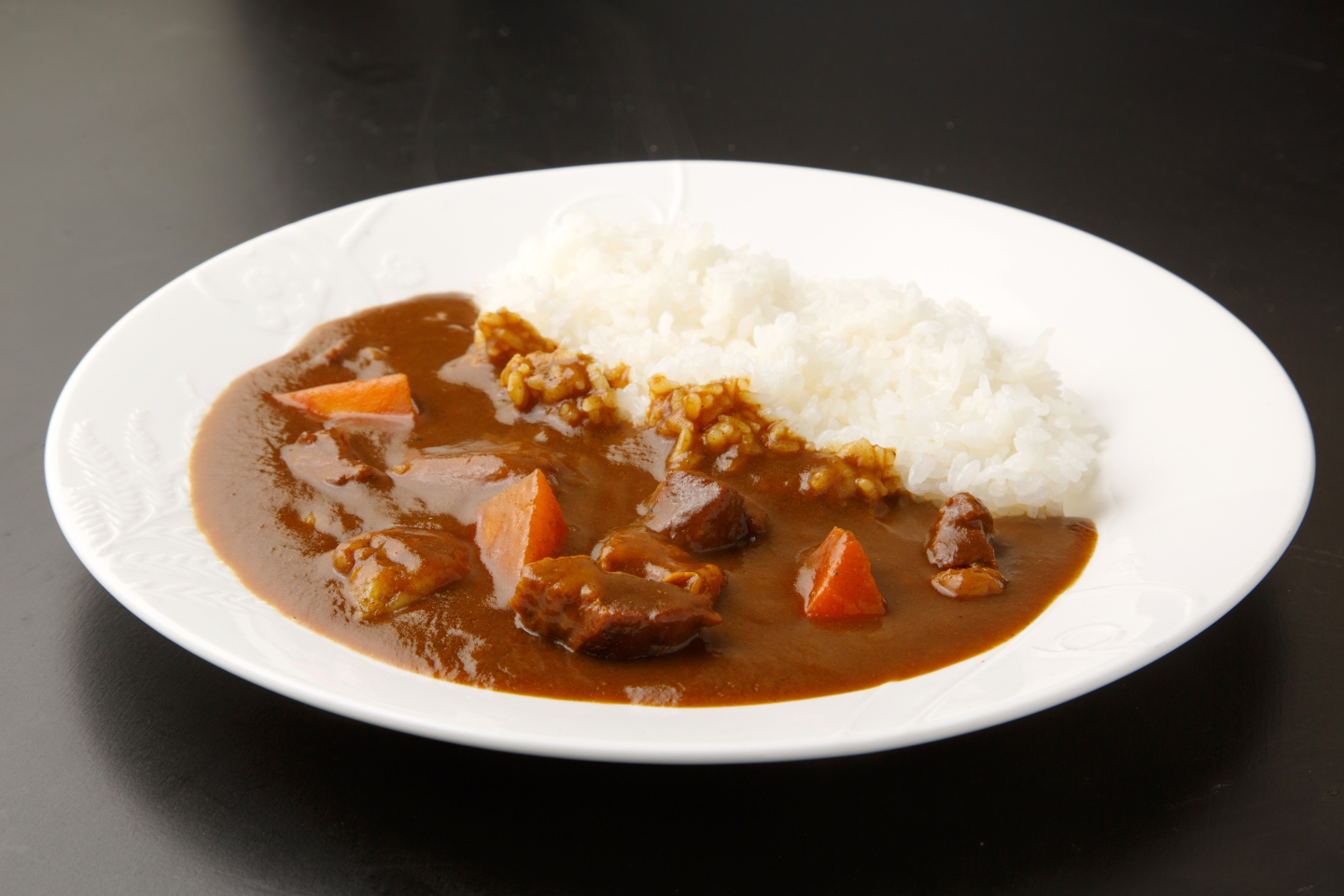 ガーリックライスで食べるきのこのポークカレ