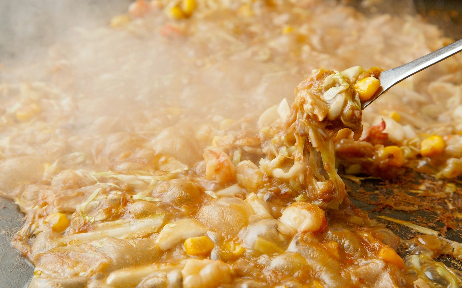 もんじゃ焼きを食べるならここ！月島もんじゃストリート - Japan Travel Planner - ANA